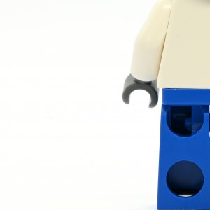 Female in blue overalls