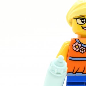 Community (Girl with baby bottle)