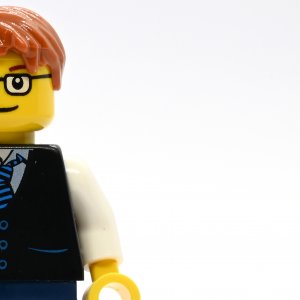 Black Vest with Blue Striped Tie